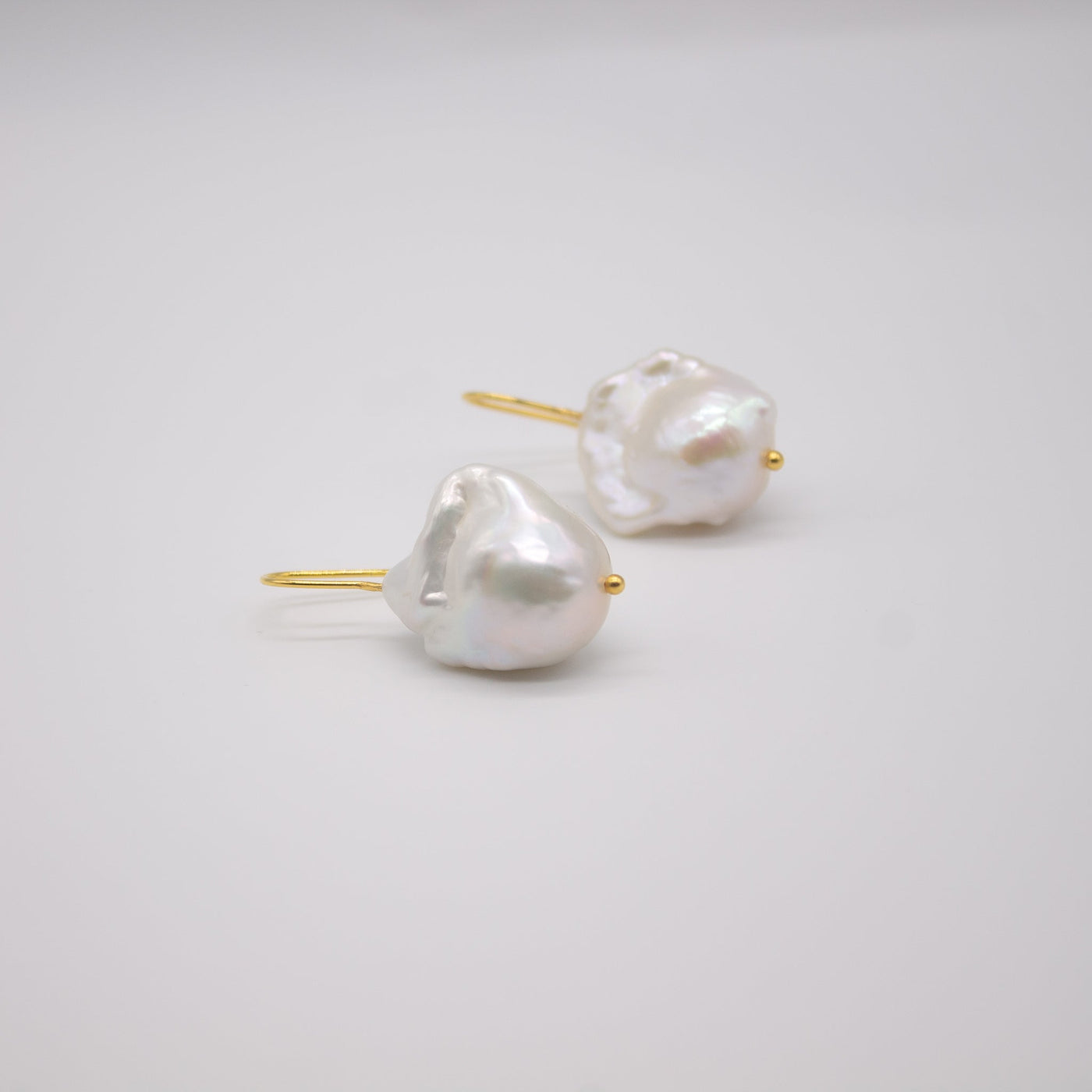 ROSENLUND // Earwires made of sterling silver with baroque pearls