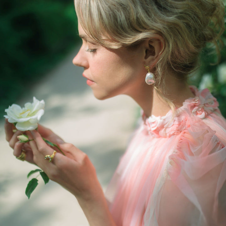 FJELLSTRAND // Gold-plated ear studs with baroque pearls