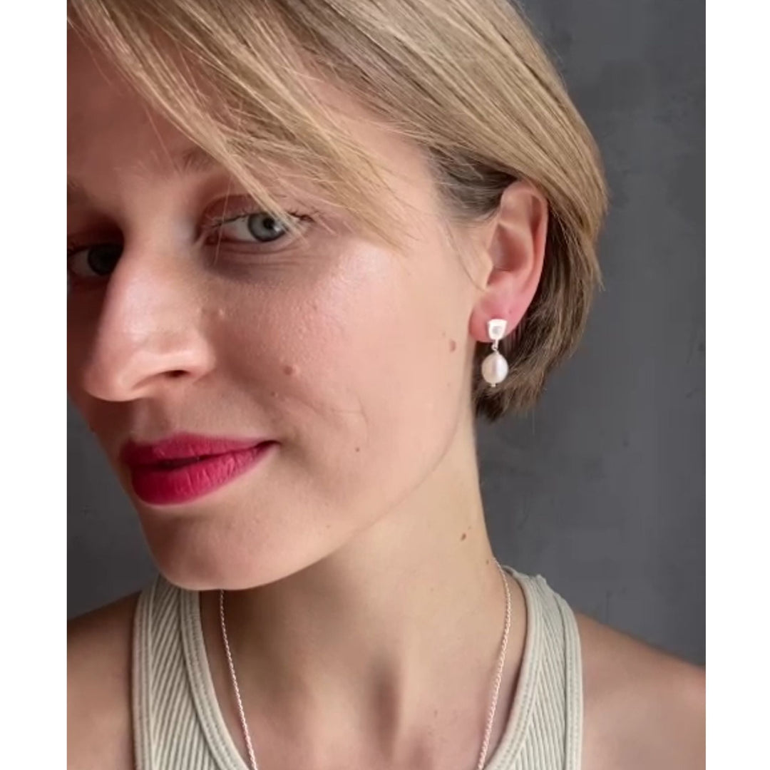 FALKEVIKA // Subtle silver earrings with delicate baroque pearl