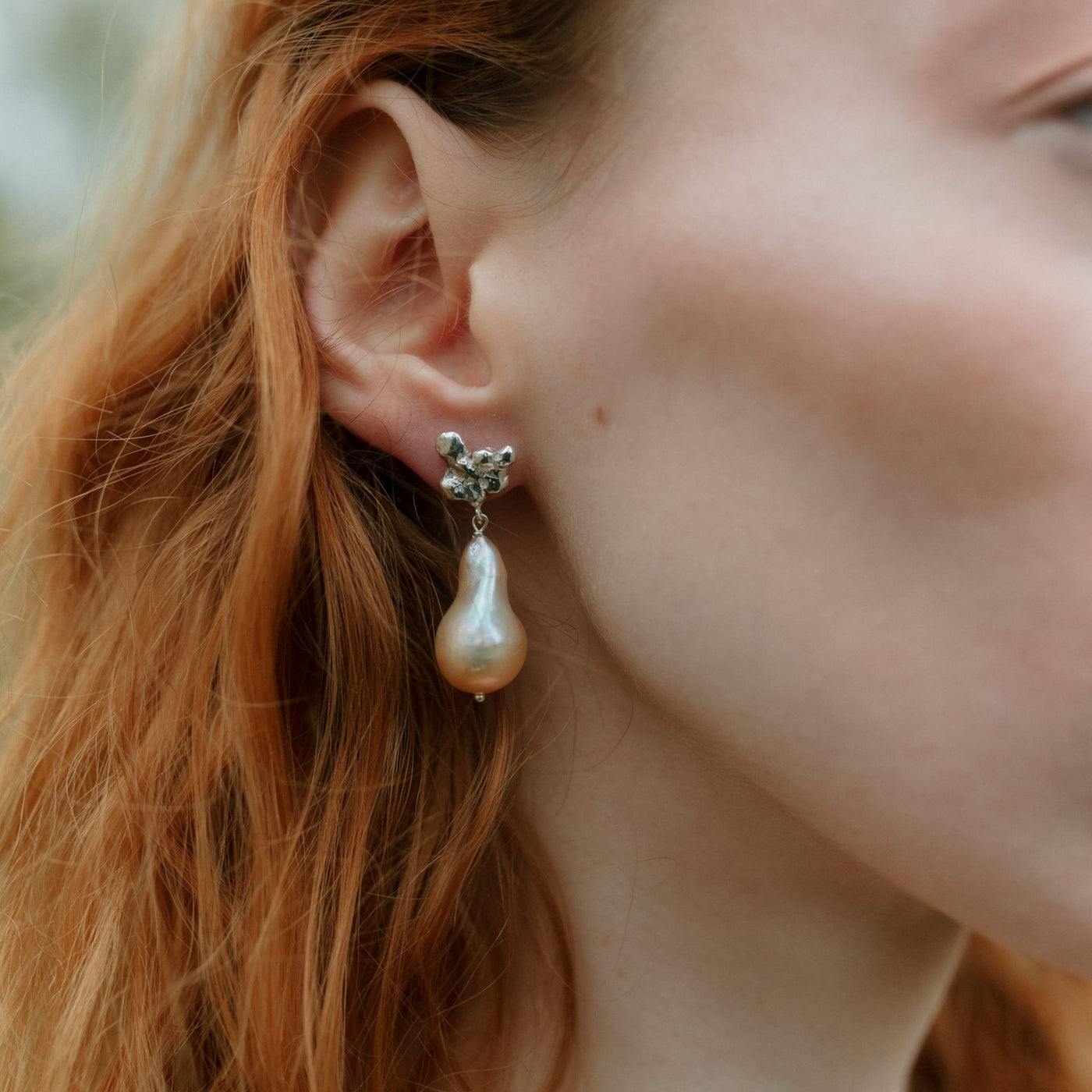 MARIENLUND // Fine silver earrings with peach-colored baroque Fireball pearls
